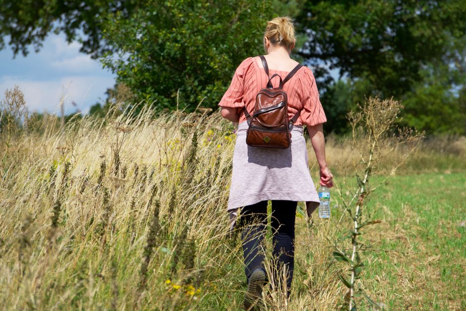 Woman enjoying a countryside walk outdoors